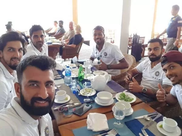 Cheteshwar Pujara eating food