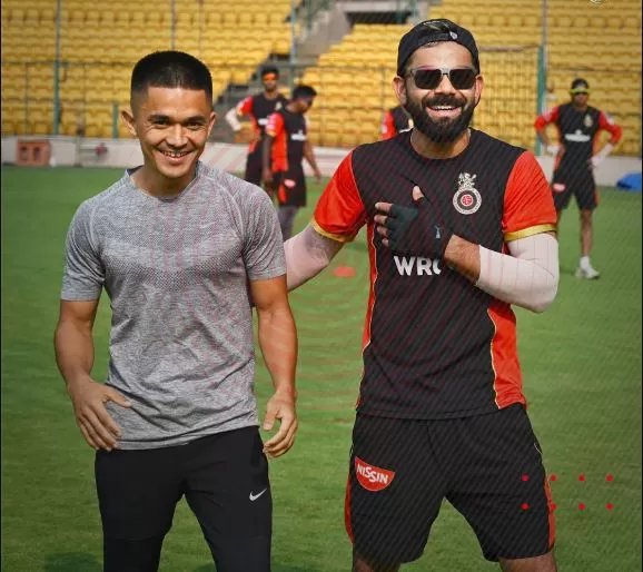 Virat Kohli with Indian Football team captain Sunil Chhetri